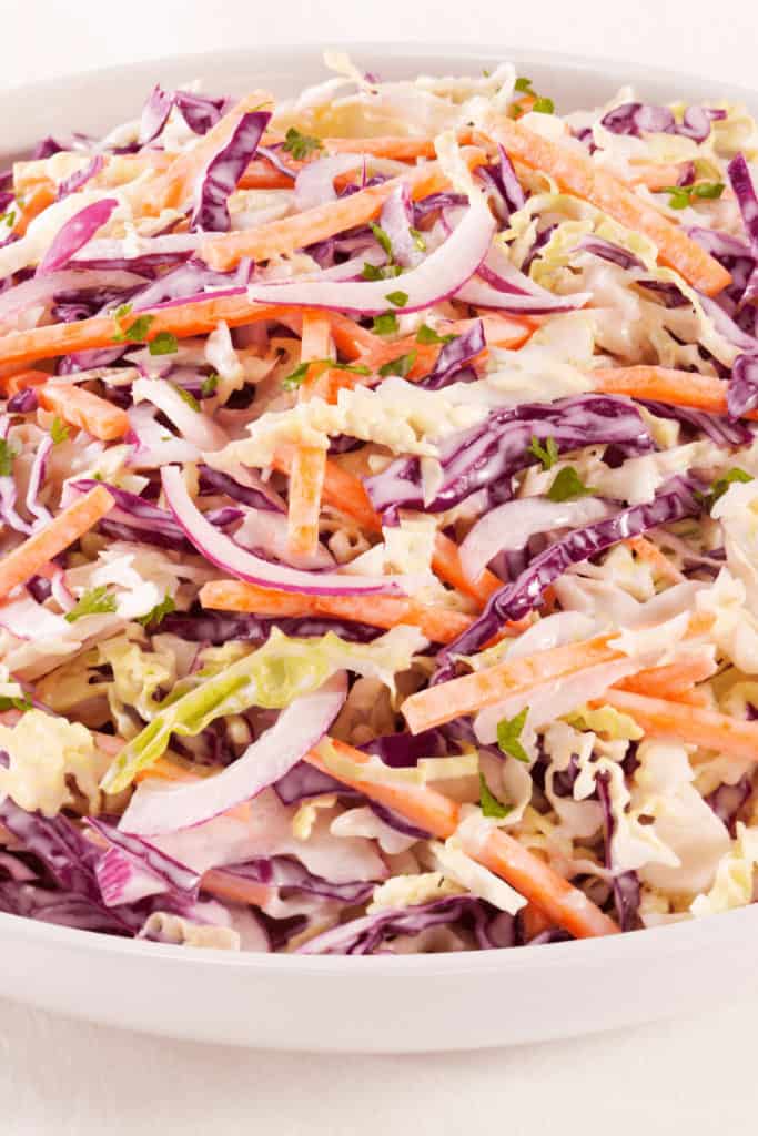 The main ingredient of coleslaw is cabbage. This is what dominates the taste