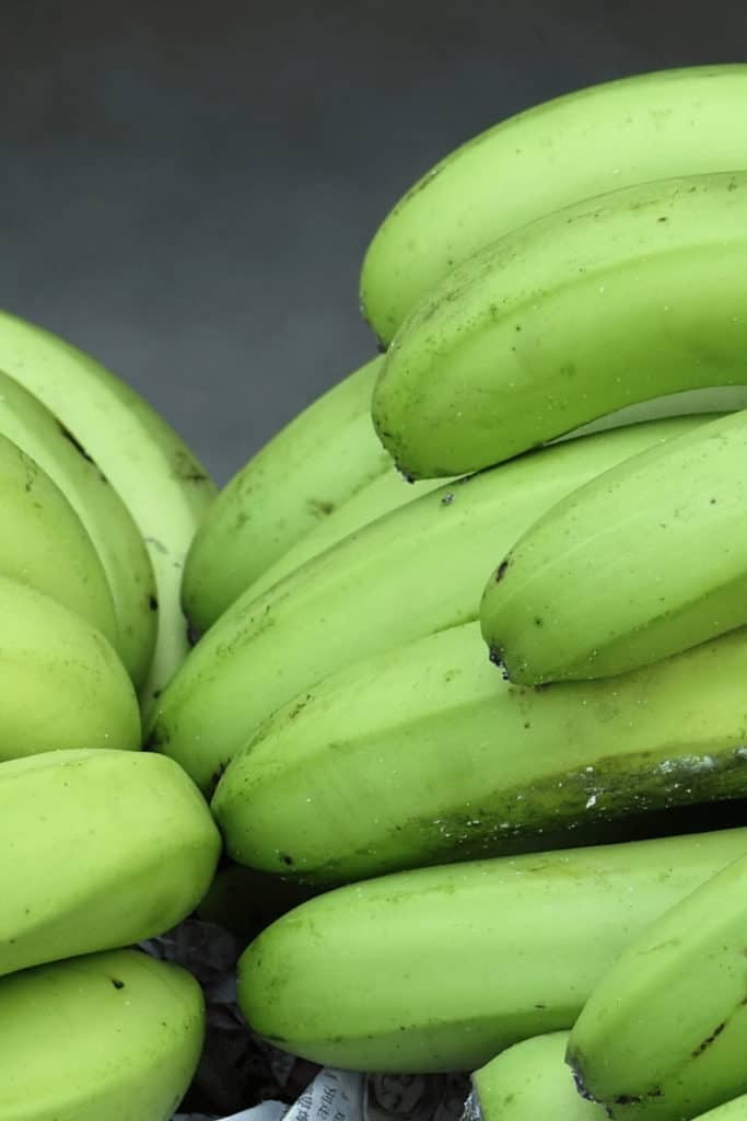 You are impatient. It takes 5-7 days for bananas to fully ripen
