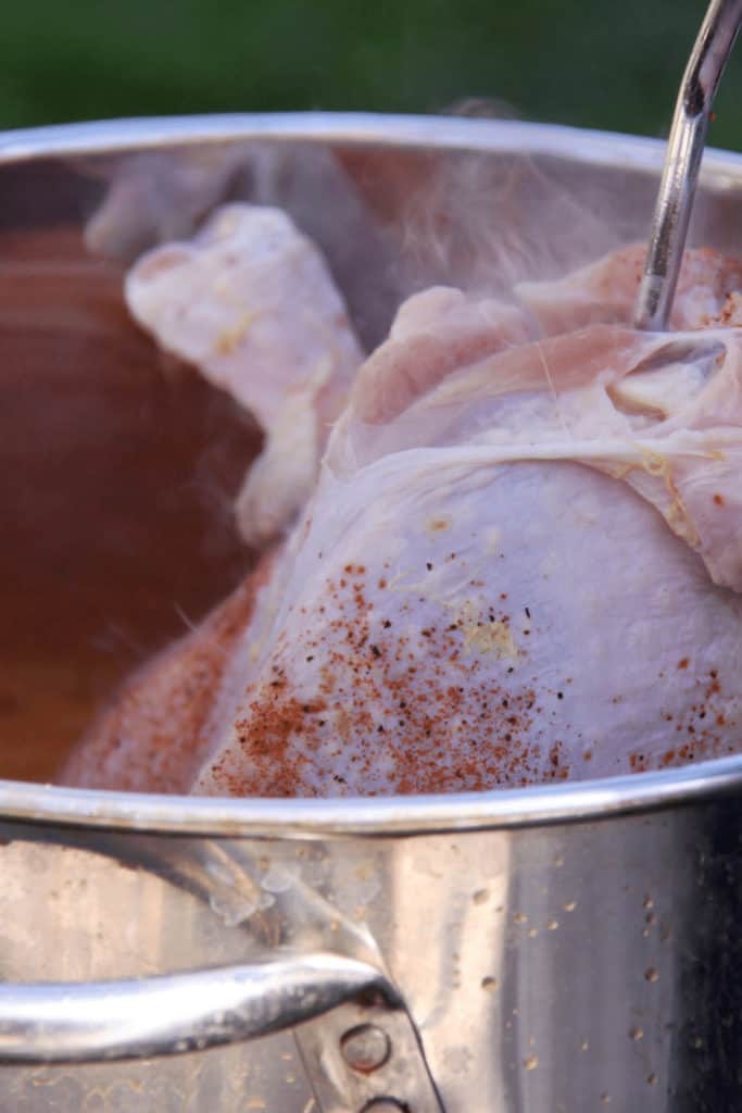 An inconsistent flame color could be the reason why a turkey fryer doesn't get hot enough caused by poor oxygen fuel