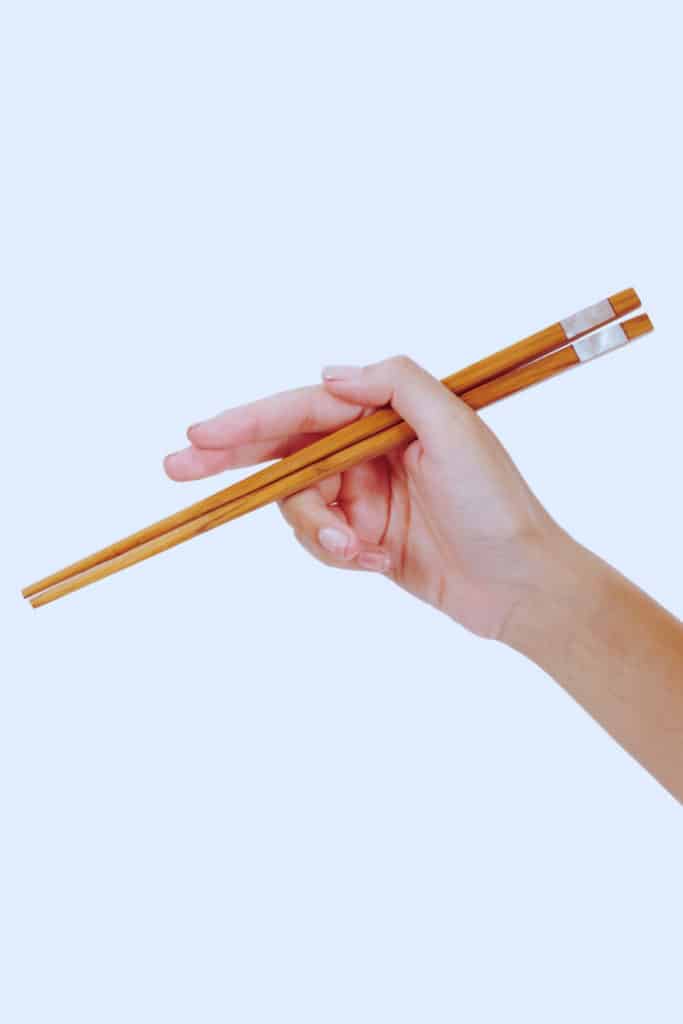 Hold Tight to the Chopsticks with the Side of your Thumb
