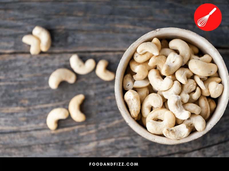 Cashews should be light brown to medium brown in color, depending on how they were prepared. If your cashews do not fall within the spectrum or if they have developed strange patches of color, it's best to throw them out