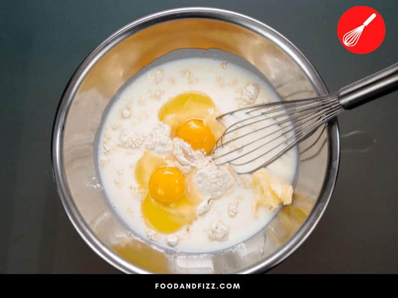 Adding two more egg yolks to the batter, using pudding or using milk instead of water are some ways you can make your box cake mix denser for carving.