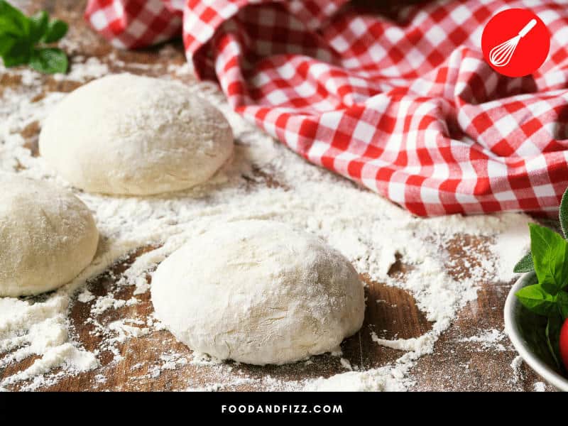 Allowing pizza dough to rest overnight before cooking delays the rise and develops flavors, resulting in a remarkable tasting pizza.