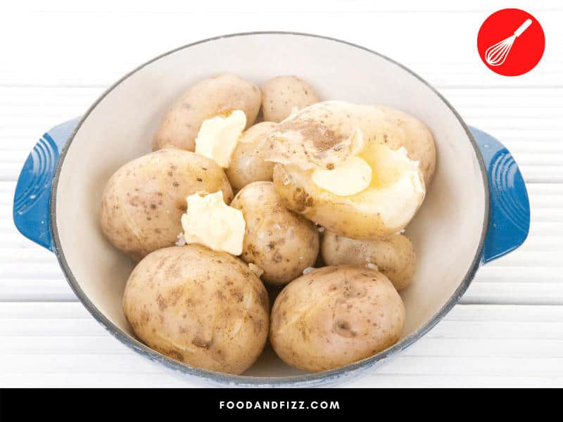 Boiled potatoes are done when you are met with little resistance when they are poked with a skewer or a knife.