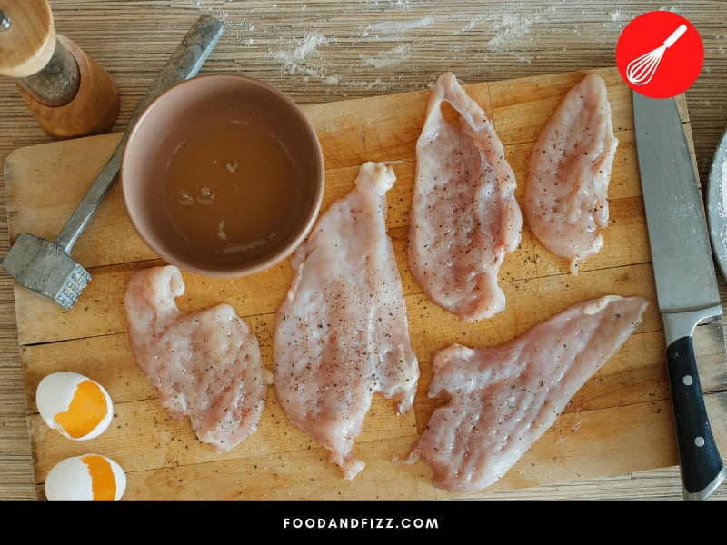 "Butterflying" chicken breast and pounding with a meat mallet prior to cooking is an effective way to ensure that they will evenly cook.