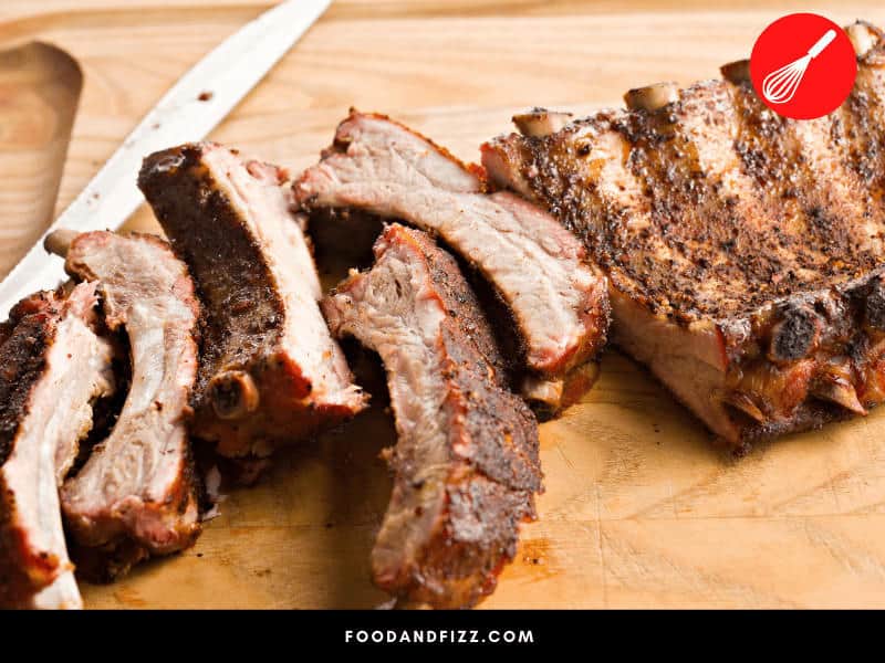 If the burnt part isn't too big, you can scrape off the burnt parts of your pork ribs.