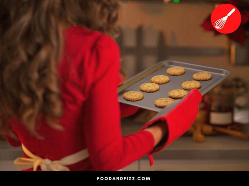 It is important to use an ungreased, unlined light metal pan for your cookies so they will stick to the pan and hold their shape.