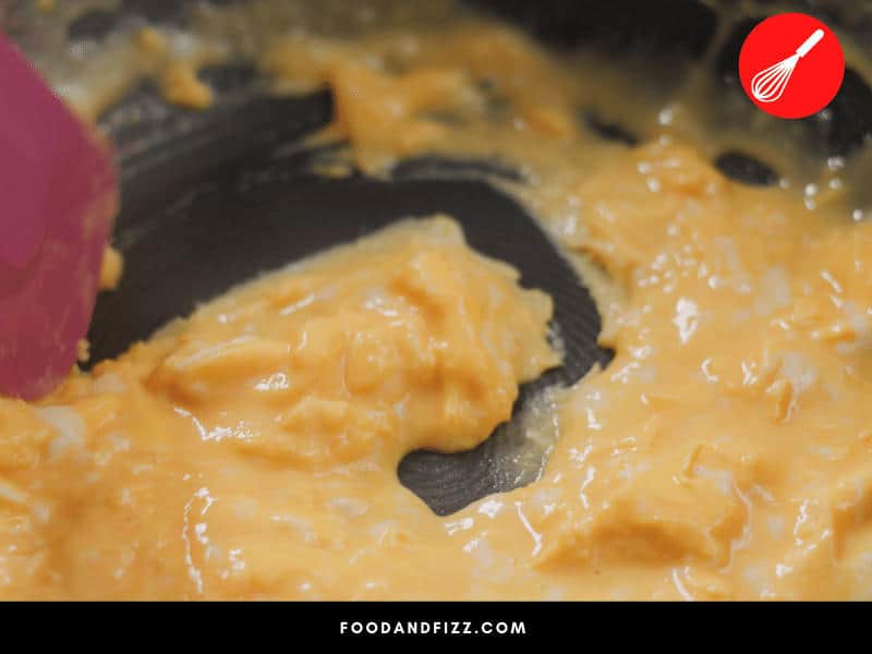 Scrambled eggs do not take a long time to cook. They should only be cooked for a few minutes on the stove, over low heat.