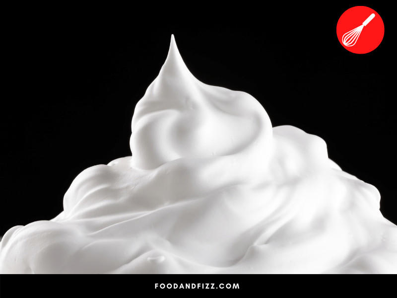 The air bubbles in whipped cream is at is largest (and therefore airiest) between the temperatures of 45 °F - 54 °F. This is when whipped cream is at its smoothest and airiest.