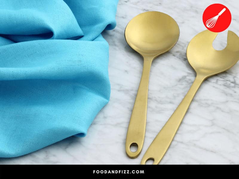 A serving spoon is specifically designed to serve food and is usually larger than other types of flatware.