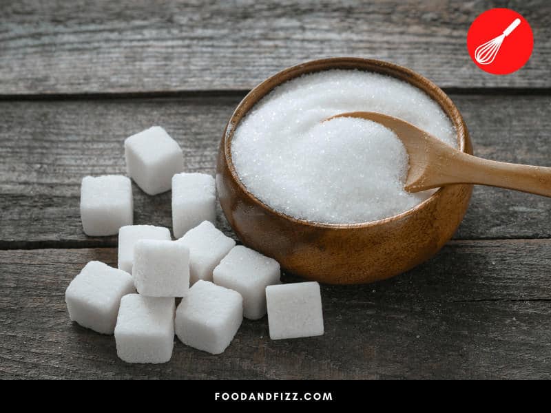 Adding a foreign particle like sugar will also prevent it from freezing by preventing water molecules from attaching and forming ice.