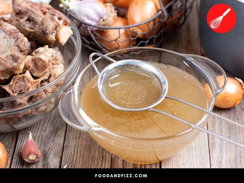 Broth is made by simmering bones and straining particles out.
