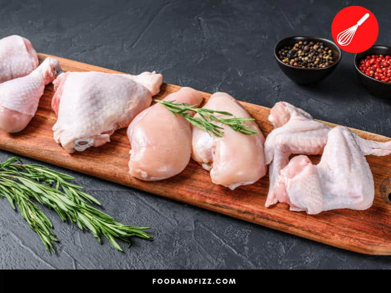Fresh raw chicken should have light pink flesh and white fat.
