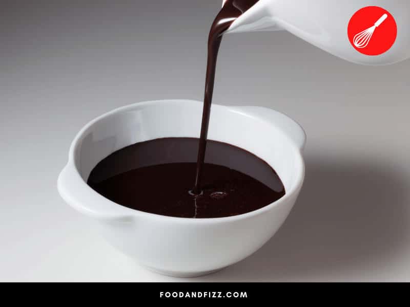 Hot fudge sauce should be creamy and pourable. Microwaving it may cause the sugar to harden and crisp up.