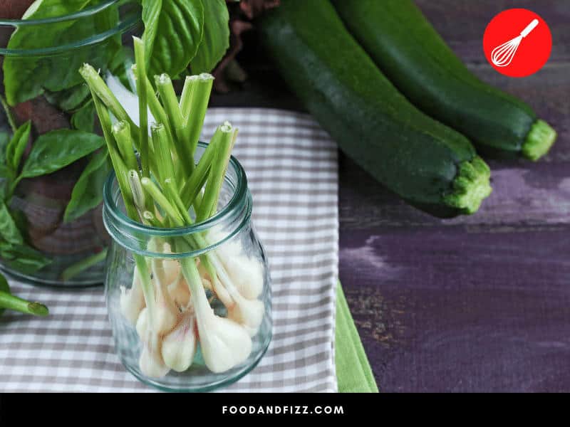 If your green onions have their roots intact, you may place them in a jar of water and cover them with a loose plastic bag over them to extend their shelf life.