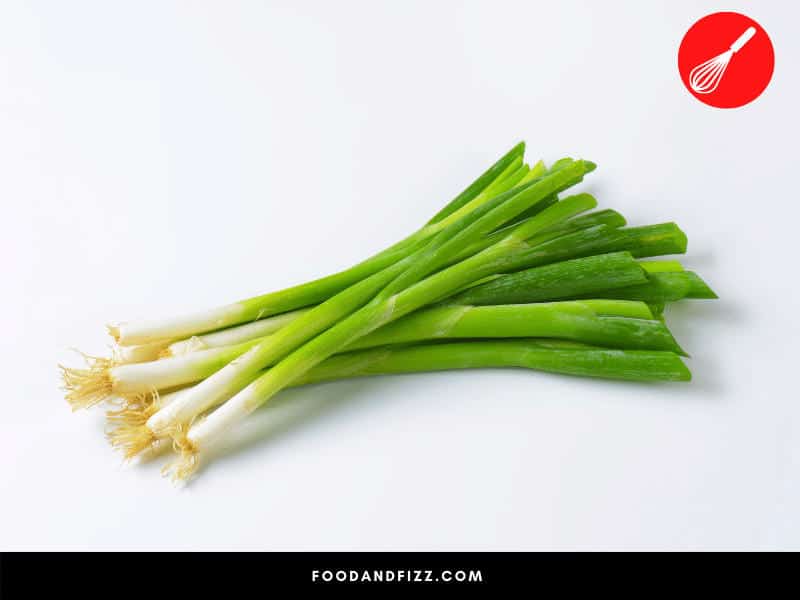 Scallions or green onions are fresh, young onions characterized by a white bottom and green leafy tops.