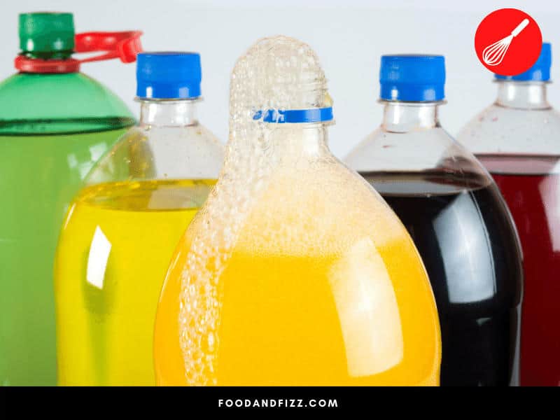 Soda is fizzy because of carbonation. Once can or bottle of soda is opened, the dissolved carbon dioxide molecules that are trapped inside escape as gas, causing the fizziness.