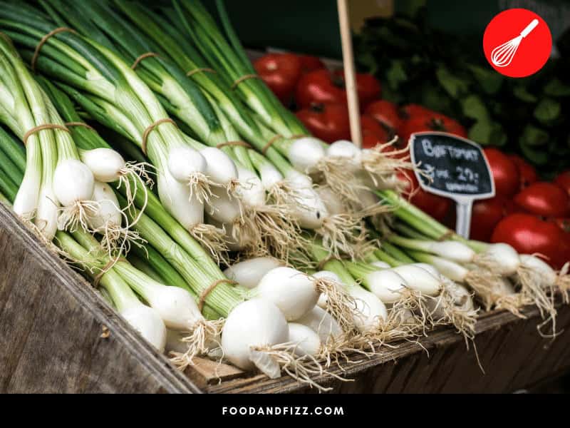 Spring onions are actually young onions that are harvested early. They are technically different from scallions even if they can be used as substitutes for each other in recipes.