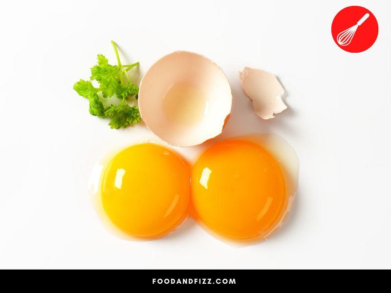 For an egg to scramble, the proteins in the yolk need to break down.