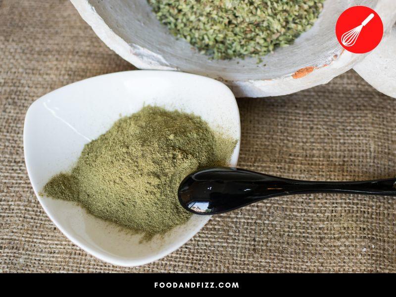 To make ground oregano, fresh oregano leaves are dried and ground into a fine powder using a herb mill.