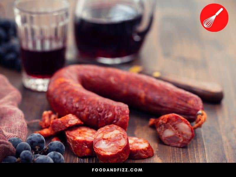 Red wine is sometimes added to Portuguese chourico.