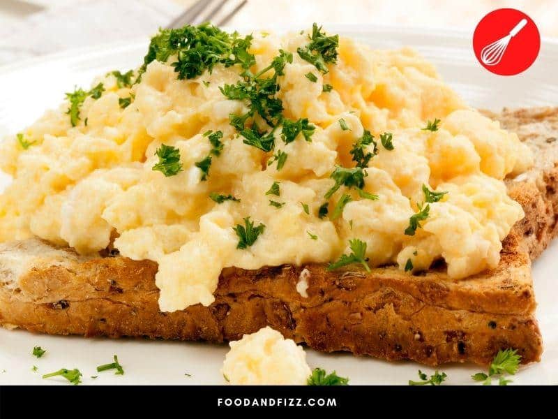 Scrambled eggs may be stored in the fridge for a few days but their texture will not be the same as freshly cooked ones.