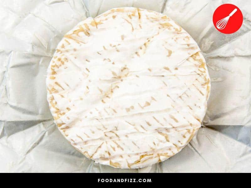 The white rind encasing brie is the good mold that is added during processing to ripen it and turn it into the creamy cheese we all love.