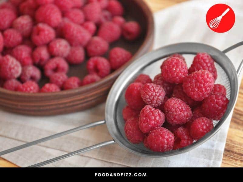 To remove raspberry seeds, you may run them through a food mill or crush them over a sieve or strainer to remove the seeds.
