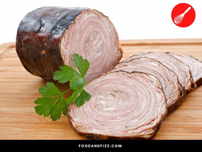 Traditional French andouille is made up of chopped up parts of the pig's stomach which are stuffed into casings of its large intestine.