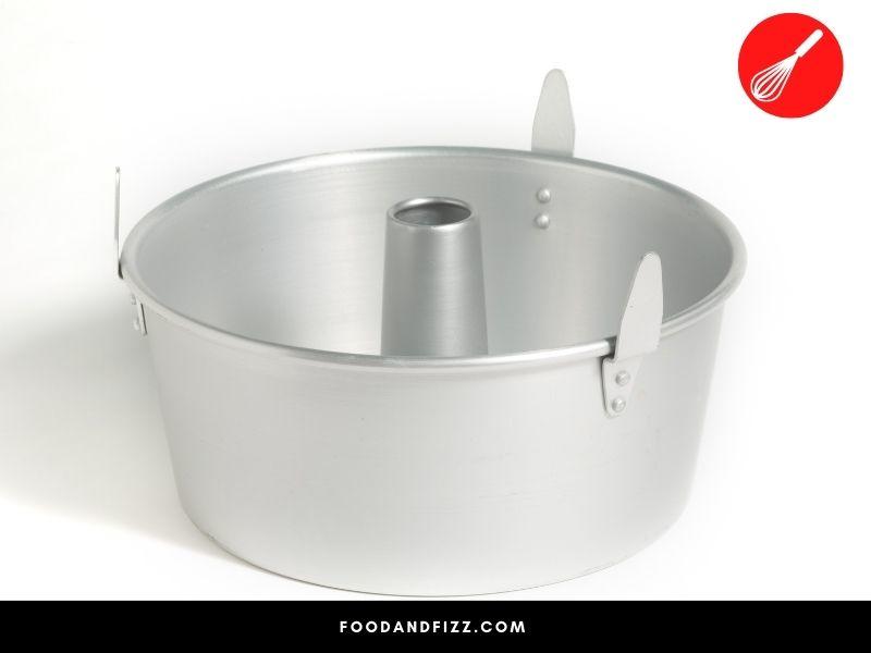 Tube pans have a hollow tube in the center to allow for even cooking, and help release cakes more easily after baking. They are essential in angel food cake.