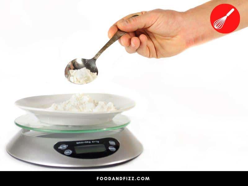 Using a scale is the most accurate way of determining how many ounces are in a third of a cup.