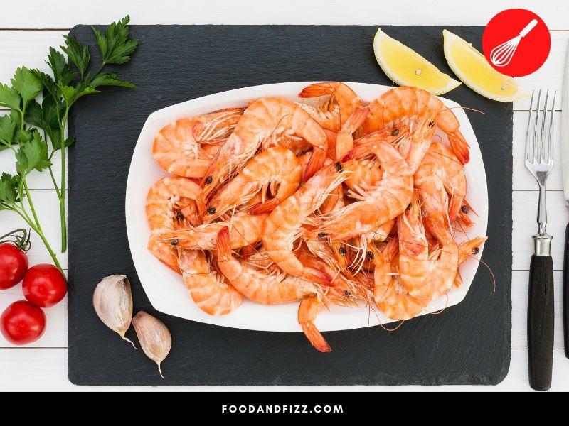 When shrimp is heated, pigments called asthaxanthins become unbound and cause the shrimp to turn pink.