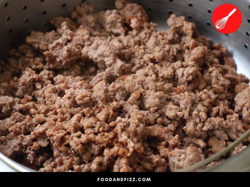 Excess fat may be drained from ground beef using a strainer.