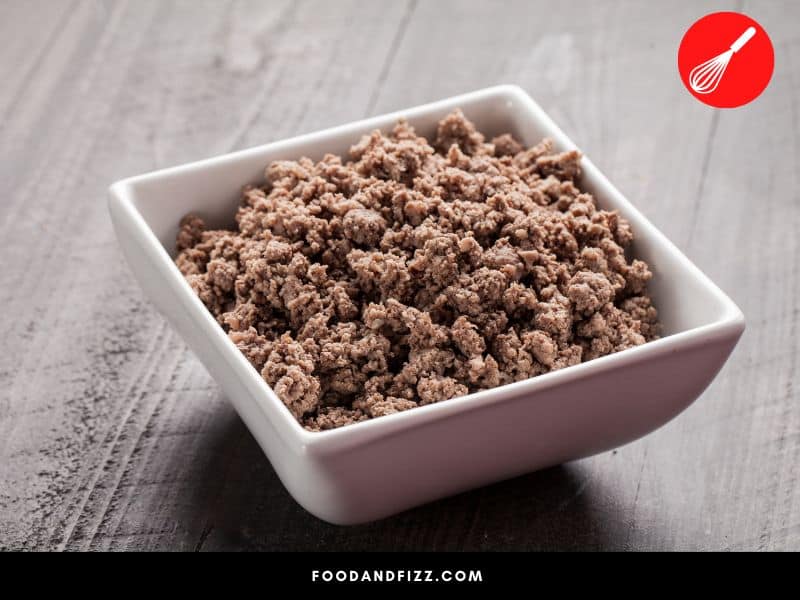 If you see white spots in cooked ground beef, it may just be the elastin or the protein.