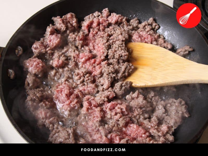 Meat turns brown as it is cooked due to the breakdown of myoglobin, and the Maillard reaction.