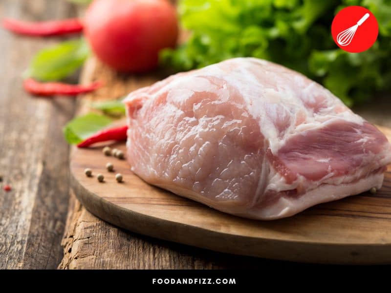 Pork has lower levels of myoglobin, the protein responsible for the red color in meat.