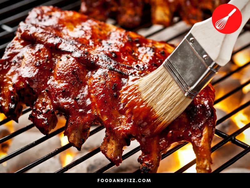 Ribs cooked BBQ-style give it that characteristic smoky and caramelized flavor.