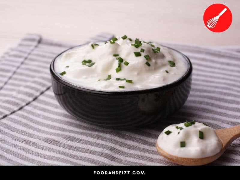 Sour cream and heavy cream both have a high fat content but sour cream will have slightly less calories.