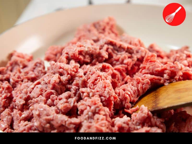 The longer the ground beef is exposed to oxygen, the more it will oxidize and eventually turn brown.