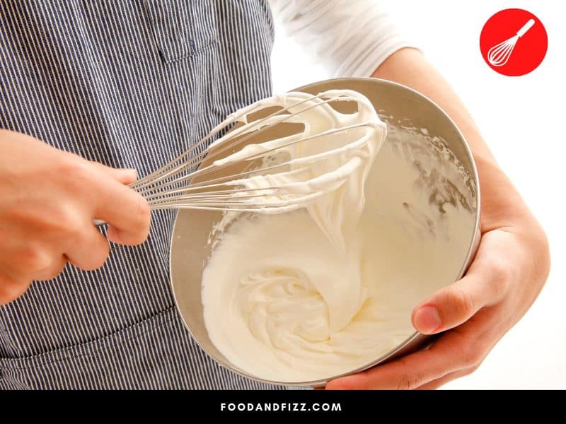 The most effective and safest way to thaw frozen whipping cream is to pop it in the fridge overnight until softened enough to use.