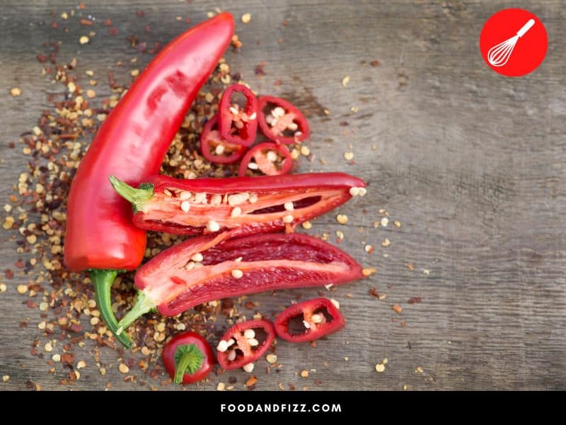 Capsaicin is produced in the inner white pith of the pepper, not the seeds.