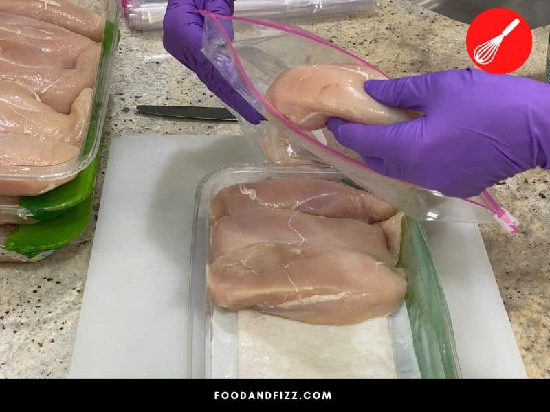 Raw chicken should be properly wrapped and stored away from other foods to prevent cross contamination.