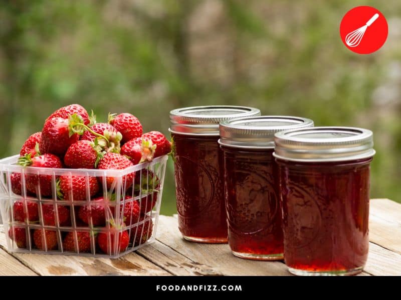 The spores of the bacteria that causes botulism are neutralized in high temperatures and acidic environments, such as the environment in a jar of fruits like strawberries.