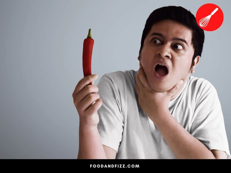 Capsaicin triggers pain receptors which is why explains the burning sensation when you eat spicy food.