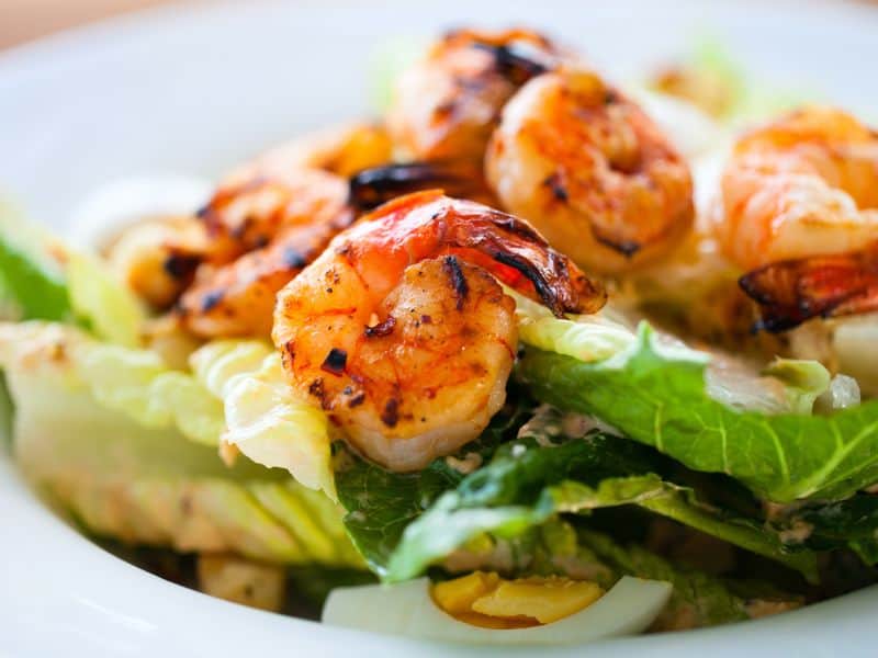 Smoking shrimp is one way to elevate its mild flavor in dishes.
